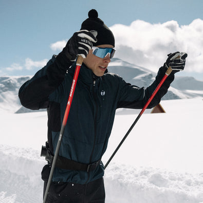 Man skiing in his warm Ambition Ski jacket