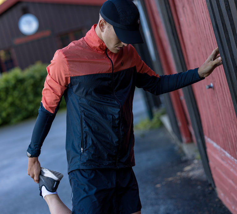 Runner streching after going out for a run.