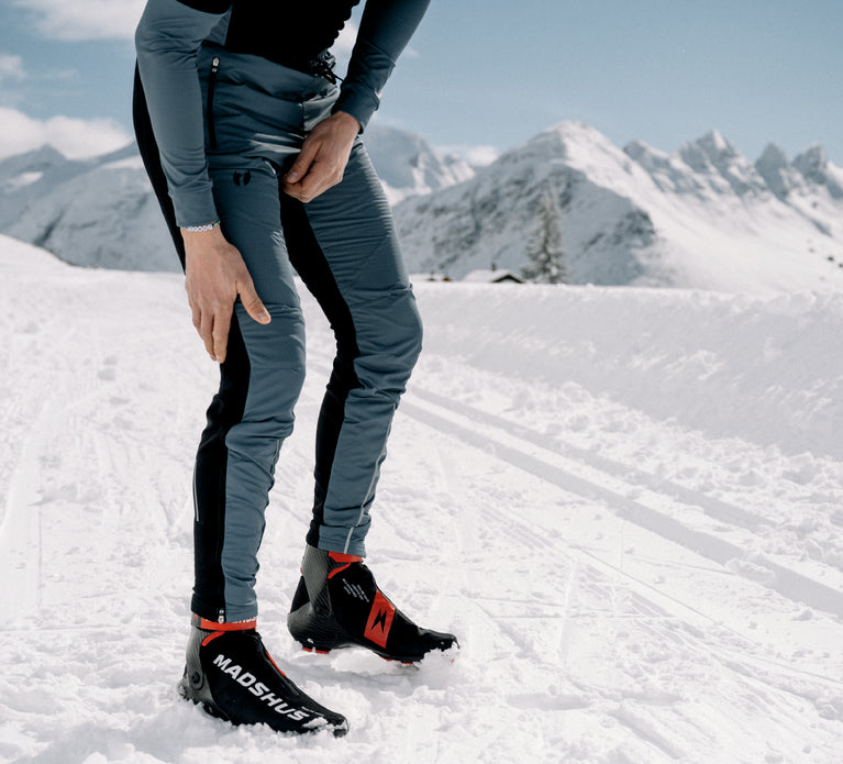 Man adjusting Trimtex Pulse Ski Pants.